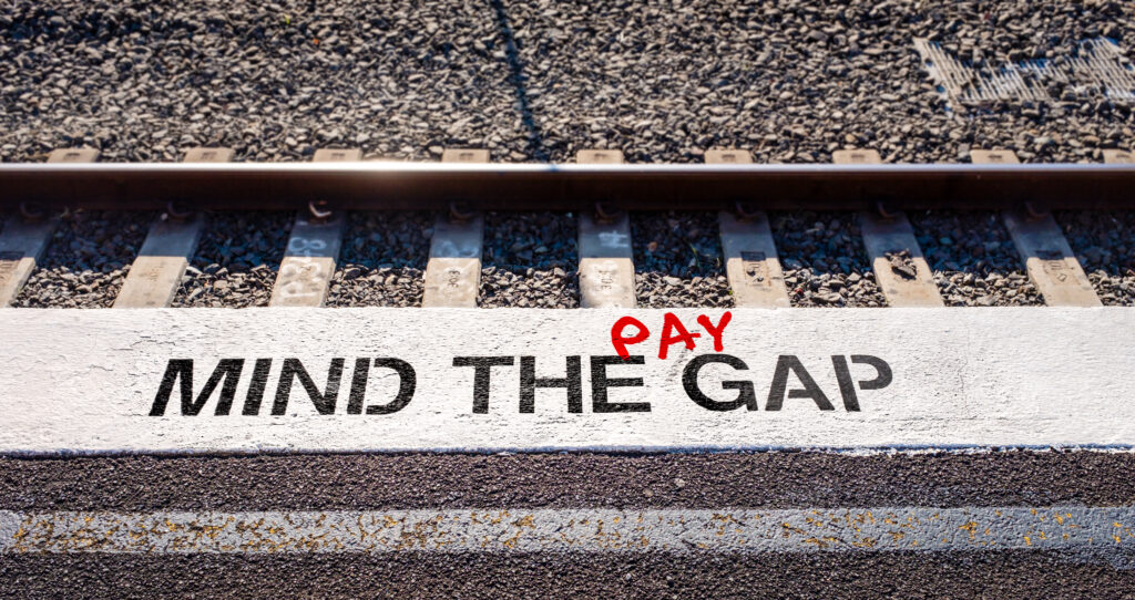Mind the pay gap graffiti