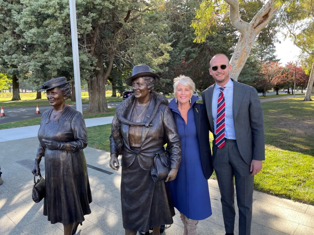Libby and her son, Enid’s great-grandson, Charlie Lyons Jones with the statues of Dame Enid Lyons, along with fellow trailblazer Dame Dorothy Tangney. Picture: Supplied
