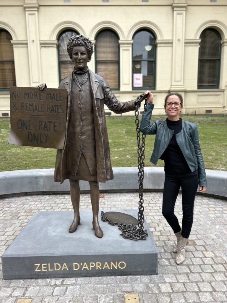 Professor Clare Wright and the statue of activist Zelda D’Aprano at Trades Hall. Picture: Supplied